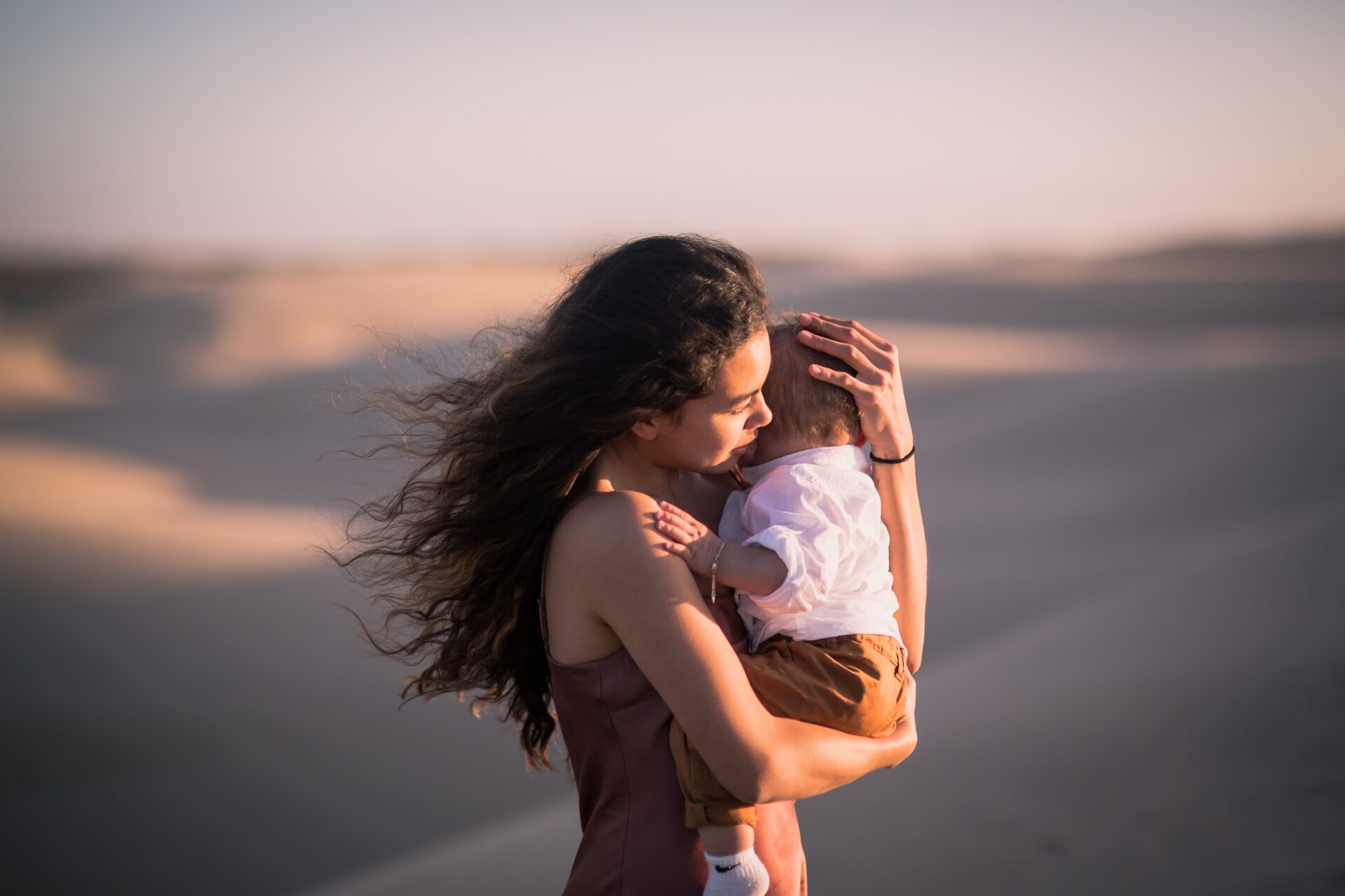 Women Hugging Boy Outdoor